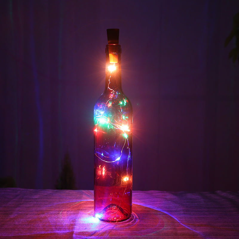 Botella de vidrio decorativa luminosa con luces LED.