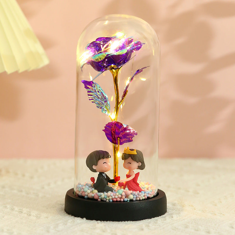 Caja de regalo con cubierta de vidrio y flor de pan de oro