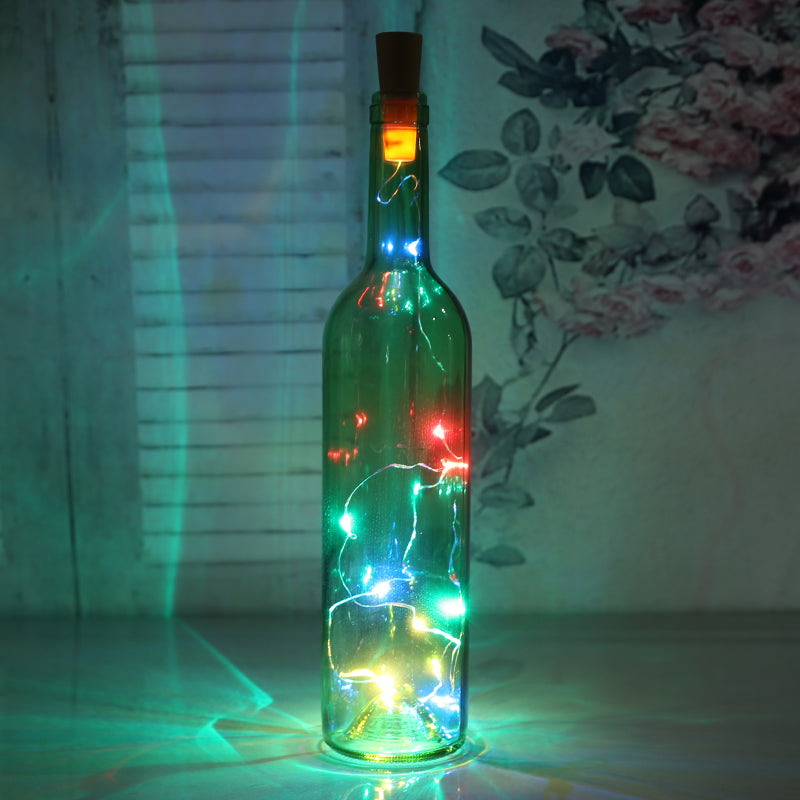 Botella de vidrio decorativa luminosa con luces LED.