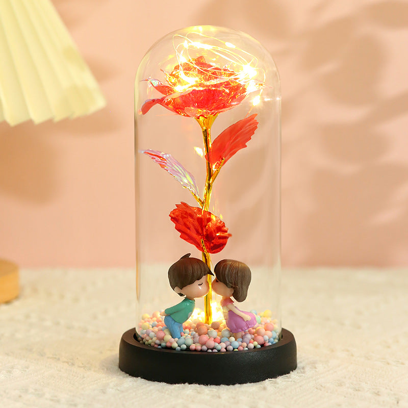 Caja de regalo con cubierta de vidrio y flor de pan de oro