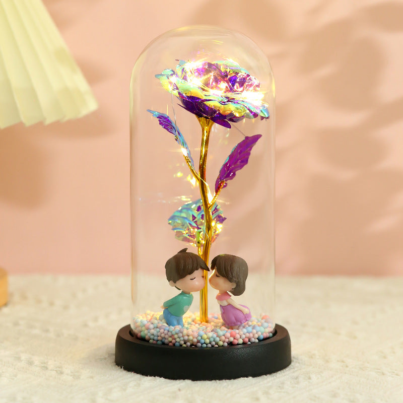 Caja de regalo con cubierta de vidrio y flor de pan de oro