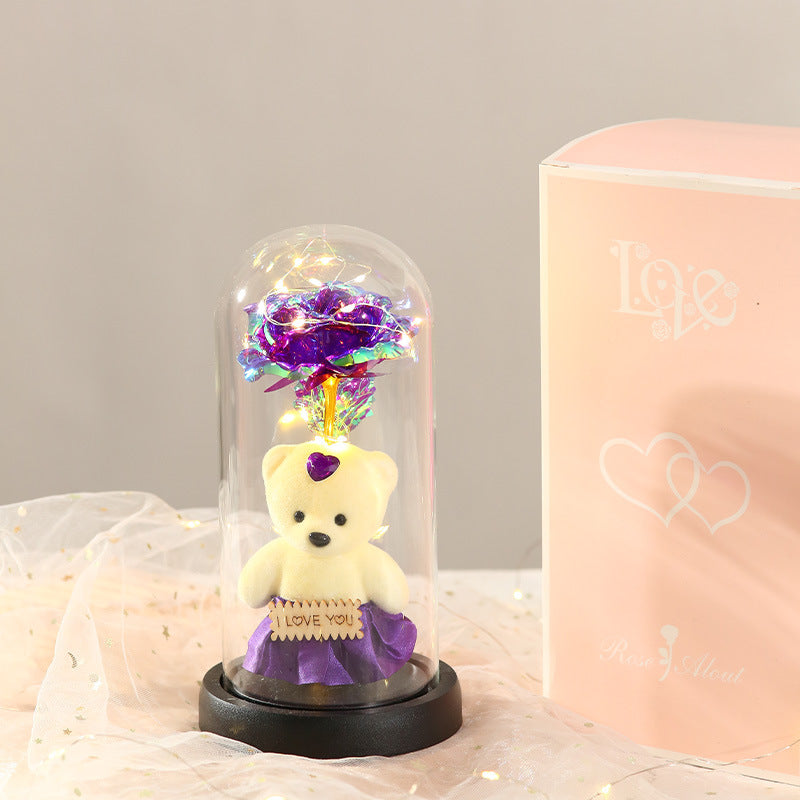 Caja de regalo con cubierta de vidrio y flor de pan de oro