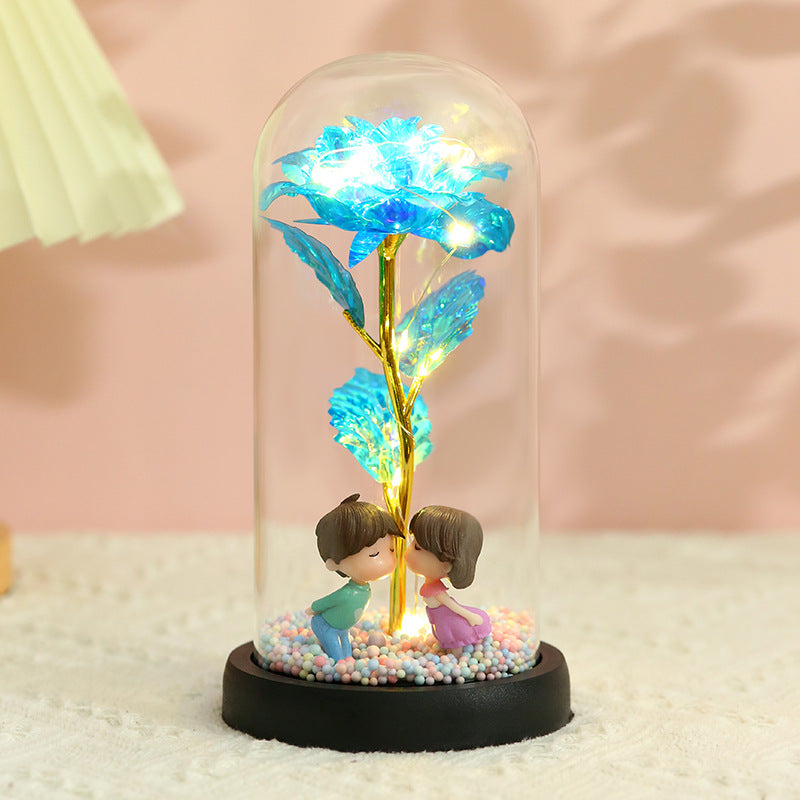 Caja de regalo con cubierta de vidrio y flor de pan de oro