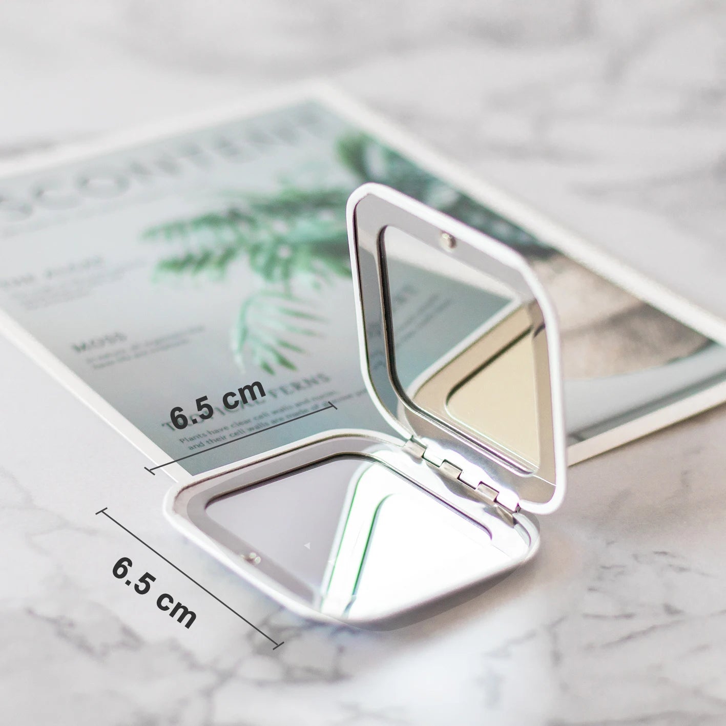 Espejo portátil de doble cara