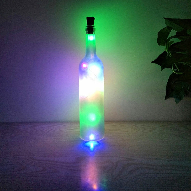 Botella de vidrio decorativa luminosa con luces LED.
