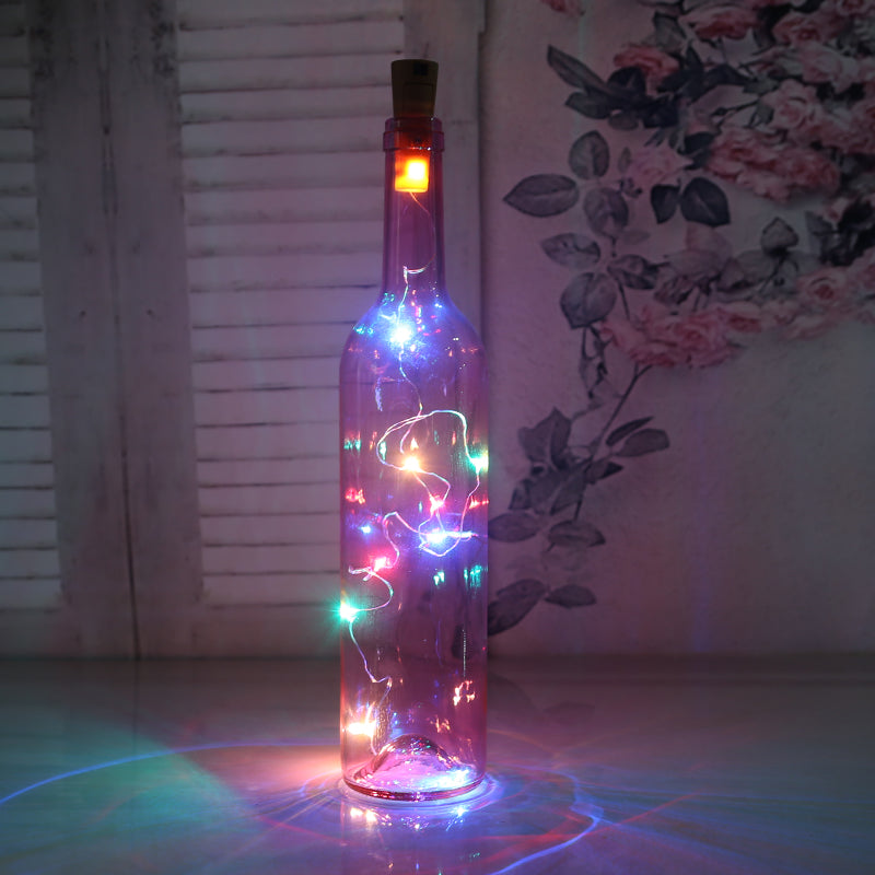 Botella de vidrio decorativa luminosa con luces LED.